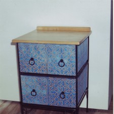 Fabric stretched chest of drawers made by Andrew Halford